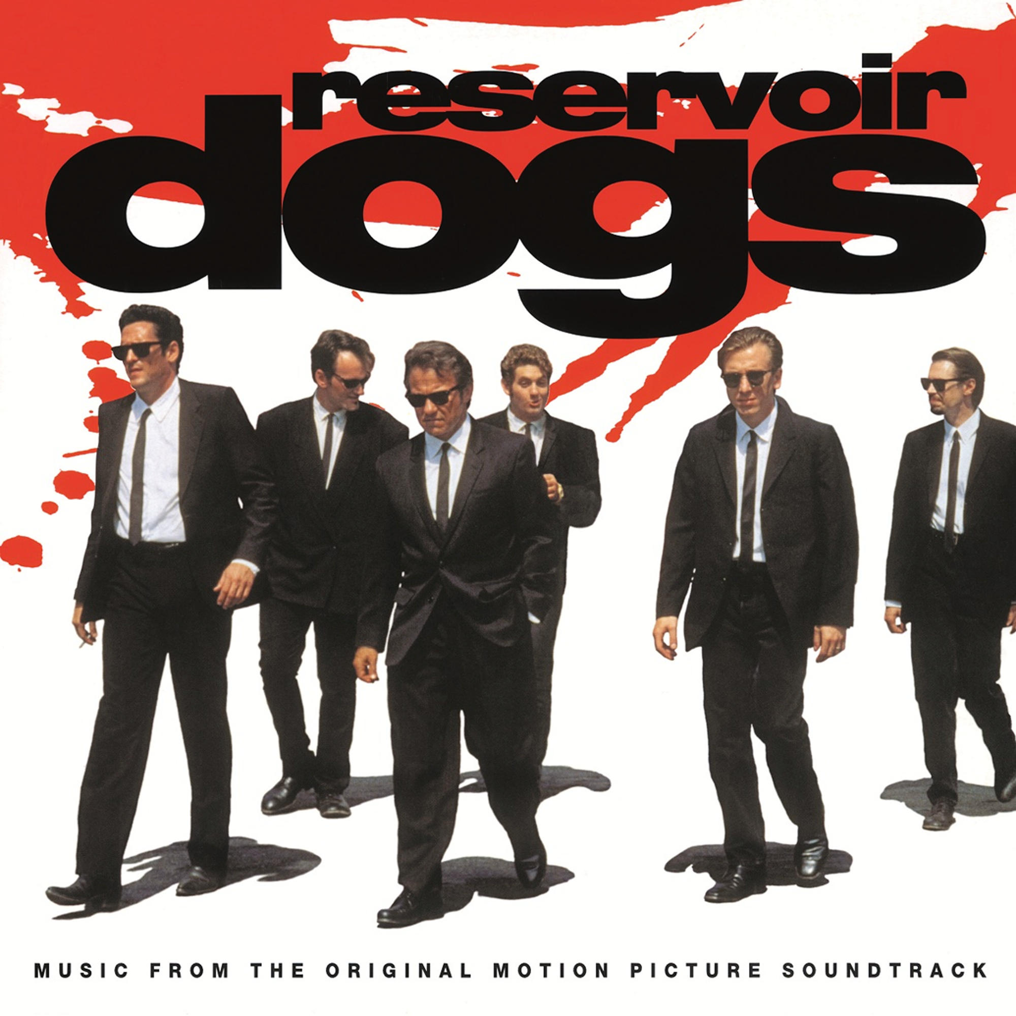 Filmposter. Zes mannen in zwarte pakken lopen. Tekst luidt "Reservoir Dogs".