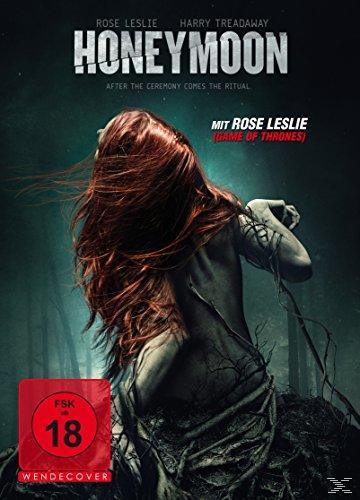 Filmposter: eine Frau mit roten Haaren in einem dunklen Wald, Text mit der Aufschrift 'Honeymoon'.