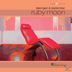 Albumcover mit rotem Stuhl und Frau vor orangefarbenem Hintergrund. Text: ruby moon.