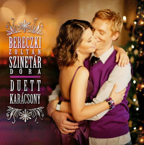 Album borító egy ölelkező párossal. Egy díszített karácsonyfa a háttérben. Szöveg felül.