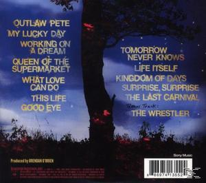 Albumcover mit Songtiteln und einem Baum mit Sternen auf blauem Hintergrund.