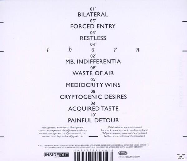 Albumrückseite mit Text. Enthält Titelliste und Informationen über die Band.
