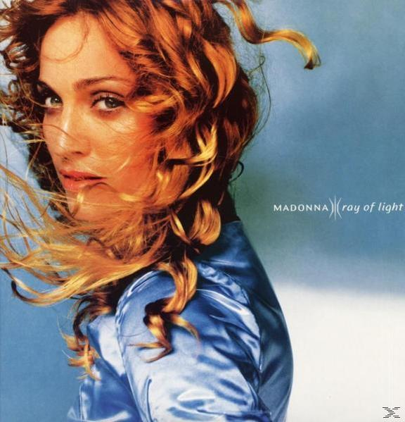 Albumcover: Madonna mit zerzaustem Haar, blauer Satinjacke und Text: Ray of Light.