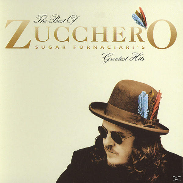 Albumcover: Zucchero, 'The Best Of'. Ein Mann mit Hut und Sonnenbrille. Gold- und Weißtext. Federn am Hut.