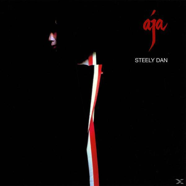 Steely Dans Albumcover. Eine Frau ist in einem dunklen Hintergrund mit rot-weißen Streifen.