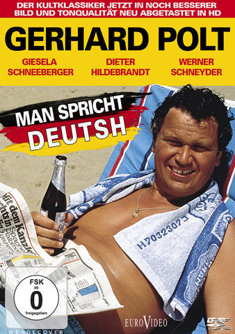 DVD-Cover: Gerhard Polt am Strand mit Flasche und Zeitung, Titel auf Deutsch: Man Spricht Deutsch.