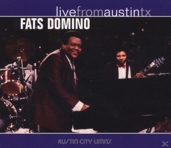Élő album borítója: Fats Domino zongorázik, zenekarral és közönséggel.