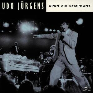 CD-Cover. Udo Jürgens auf der Bühne, singt in ein Mikrofon, mit Band und Publikum im Hintergrund.