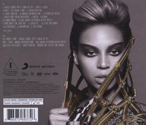 Album-Rückseite: Beyonce. Frau mit Make-up, hochgestecktem Haar, hält Goldstruktur, blickt in Kamera.