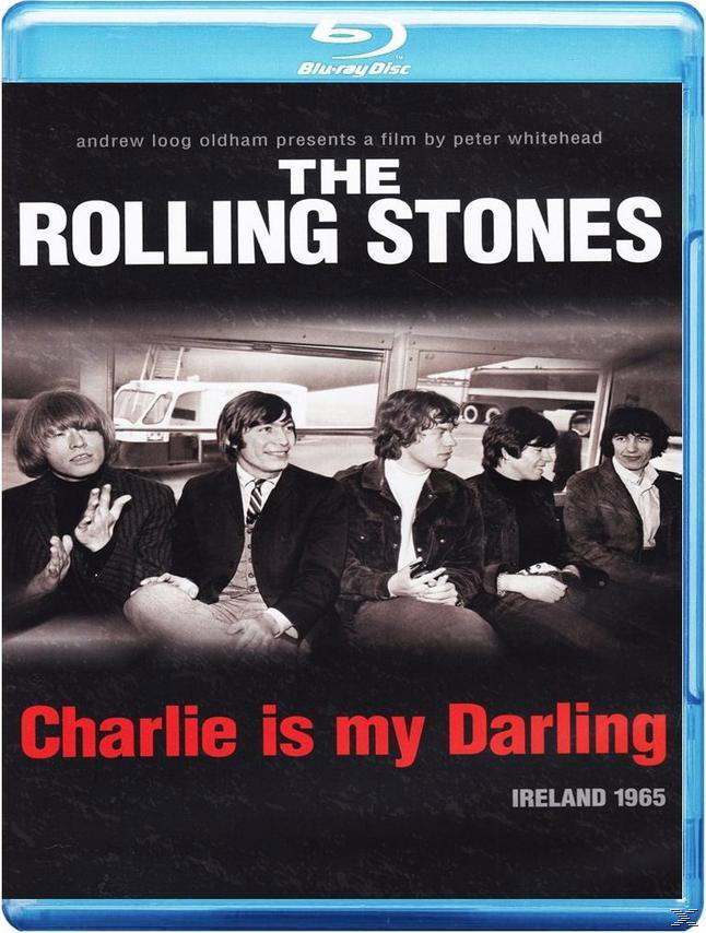 A Rolling Stones Blu-ray borítója, öt férfi ül egy autón, fehér háttér, felül szöveg.