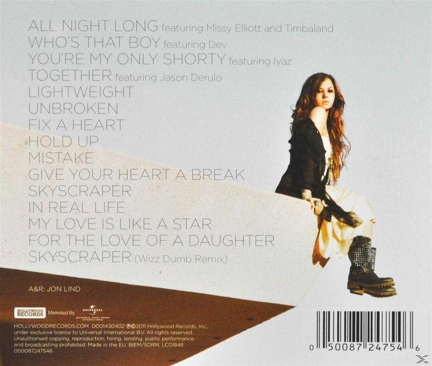 Albumrückseite mit Songtiteln und einer Frau, die mit Stiefeln sitzt, und Text.