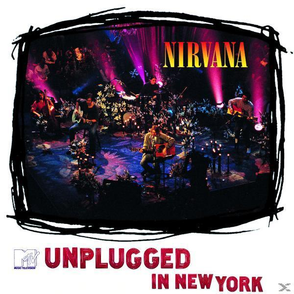Pochette de l'album Nirvana MTV Unplugged in New York, groupe sur scène, fond sombre.