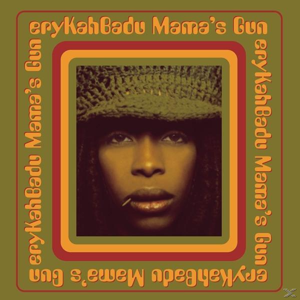 Erykah Badus Albumcover mit ihrem Porträt in einem farbenfrohen Retro-Rahmen auf grünem Hintergrund.