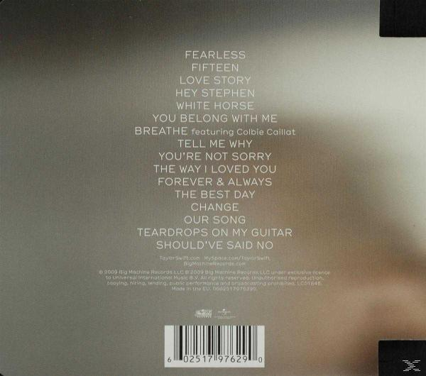 Album back cover with song list and credits. Barcode at the bottom. Gray background.