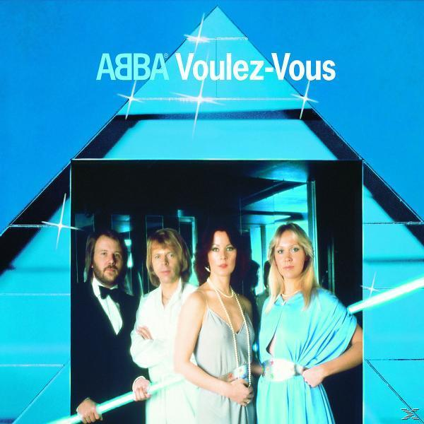 Albumcover mit vier Personen, Titel "ABBA Voulez-Vous" und blauem Hintergrund.