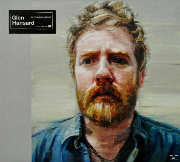Porträt von Glen Hansard mit Bart und blauem Hemd. Albumcover, 'Rhythm and Repose'.