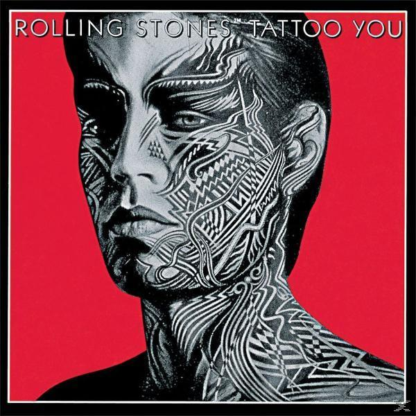 Albumcover für 'Tattoo You' von Rolling Stones, mit einem Gesicht mit aufwendigen Tattoos auf rotem Hintergrund.