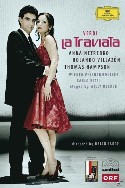 Operaplakát: Öltönyös férfi öleli a vörös ruhás nőt. Cím: La Traviata. Előadók nevei. Rendezte: Brian Large.