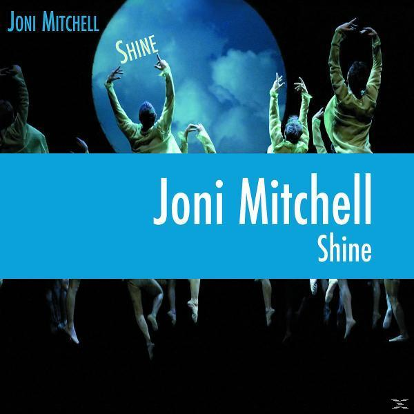Joni Mitchell előadása táncosokkal. Kék háttér, "SHINE" és az album címe.