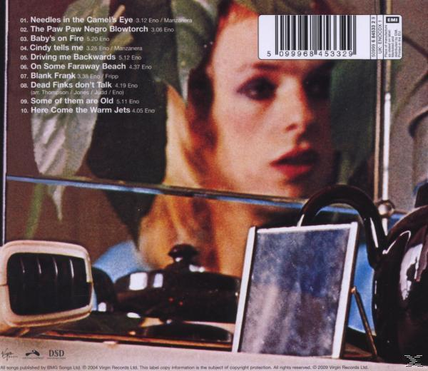 Dos de l'album avec le reflet d'une femme dans un miroir. La liste des chansons est répertoriée sur le côté gauche.