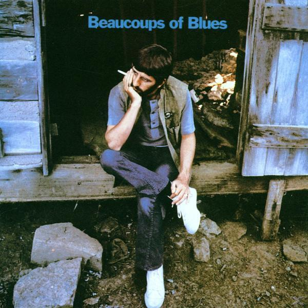Albumcover: Mann sitzt auf der Veranda und raucht. Titel 'Beaucoups of Blues'.