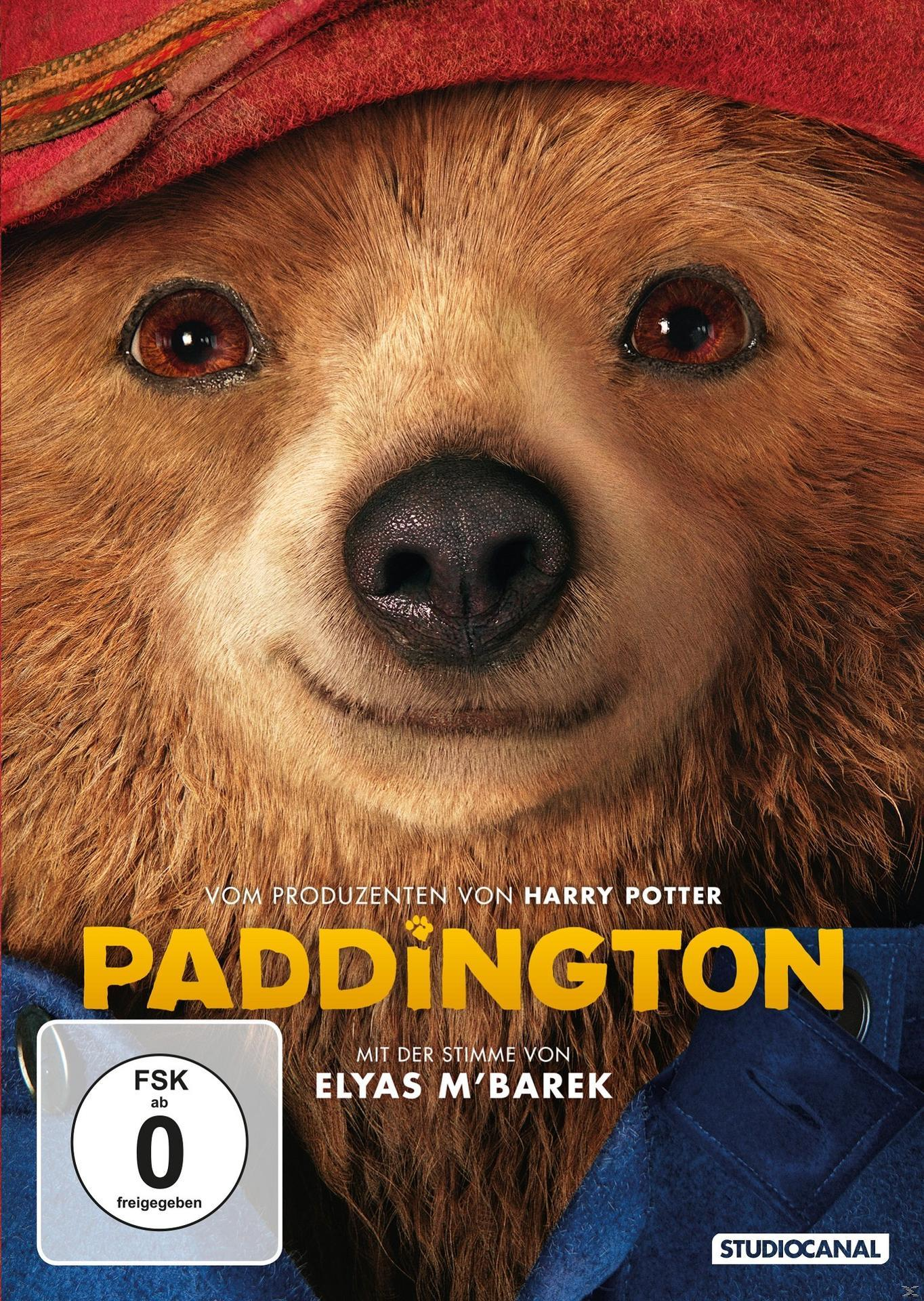 Filmposter mit Nahaufnahme des Gesichts eines Teddybären. Titel: Paddington.