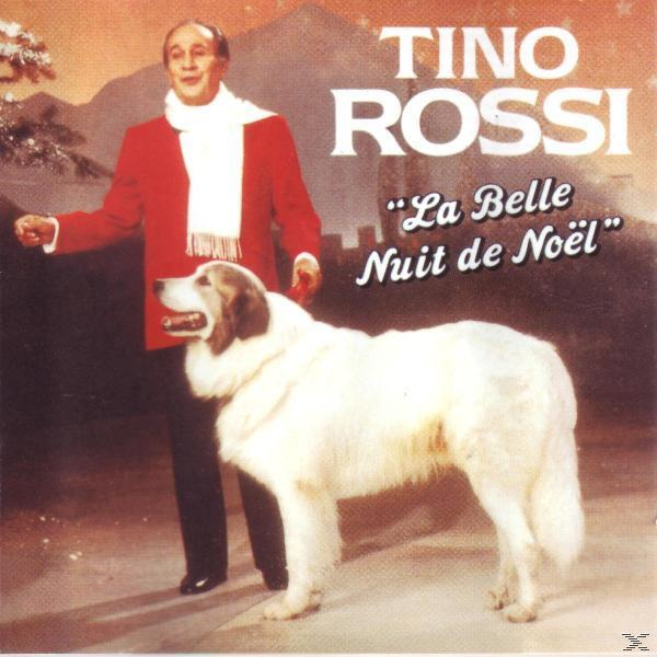 Albumcover mit Tino Rossi, im roten Mantel mit weißem Hund. Verschneite Bergkulisse.