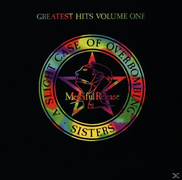 Albumcover. Ein kreisförmiges Design mit Text und einem Bild einer Person. Titel: Greatest Hits.