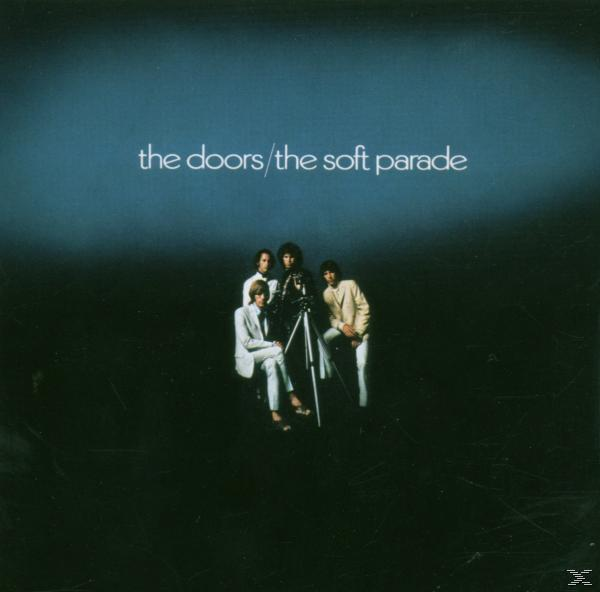 Albumcover von The Doors. Vier Männer posieren vor einer Kamera mit Text.