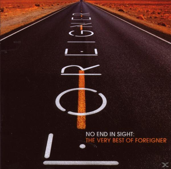 Albumcover mit einer Straße mit der Aufschrift 'FOREIGNER'. 'NO END IN SIGHT' und Albumtitel sind darauf geschrieben.