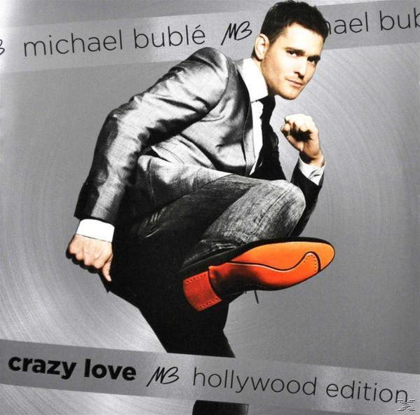 Mann im Anzug tritt einen orangenen Schuh, vor grauem Hintergrund. Albumcover.