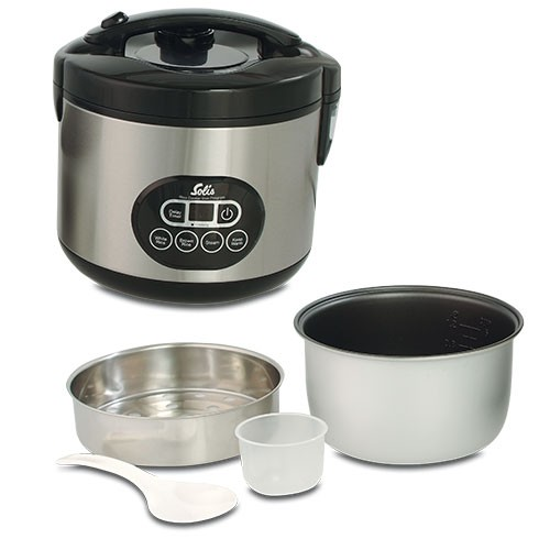 Rice cooker with accessories: bowls, spoon, and inner pot.