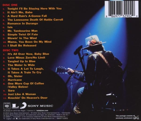 Rückseite einer CD mit der Titelliste eines Bob Dylan Albums und einem Foto von ihm beim Gitarrenspiel.