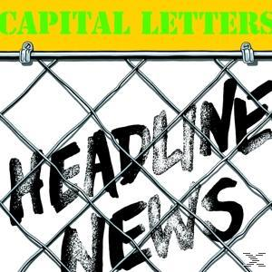 Albumcover mit einem Maschendrahtzaun und den Worten 'HEADLINE NEWS'. Text: CAPITAL LETTERS.