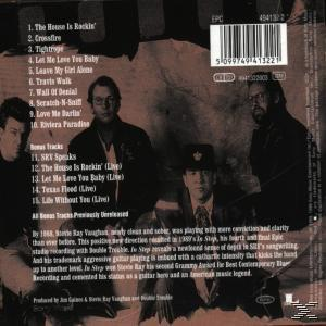 CD-Cover mit einer Band von vier Männern, Text und Titelliste, und einem Bandfoto.