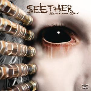 Seether - Karma and Effect Albumcover. Nahaufnahme eines Auges mit metallischen Aufsätzen.