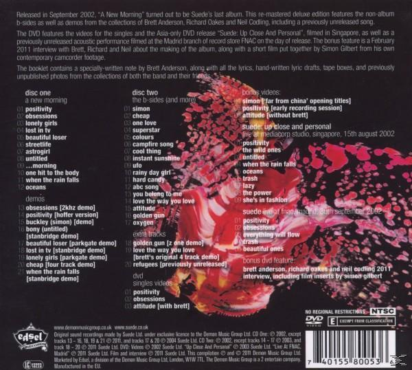 CD-Cover mit Text über das Album, Fotos und Bonus-Videos. Suede-Band bezogen.
