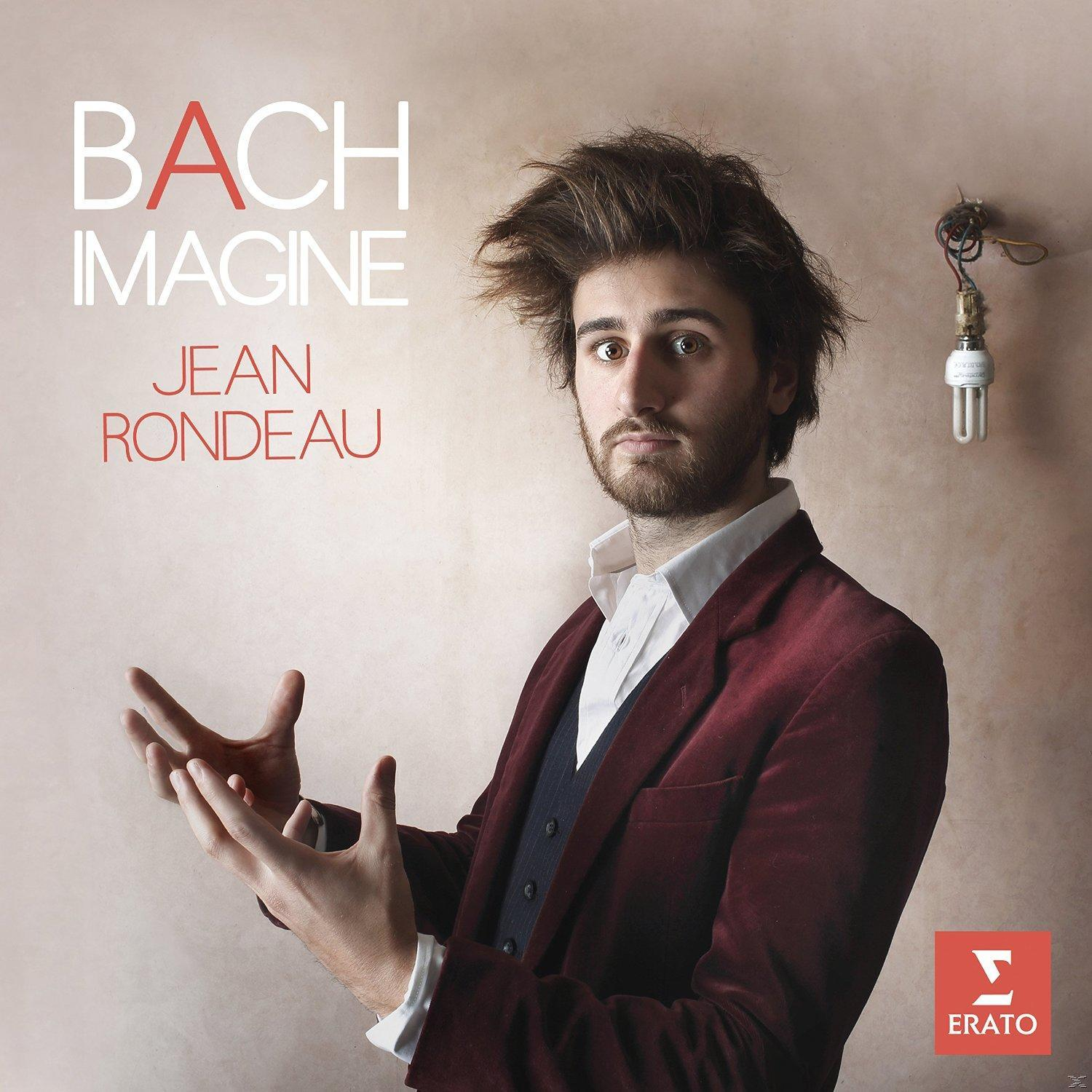Albumcover: Mann mit zerzaustem Haar, in roter Jacke, schaut in die Kamera.