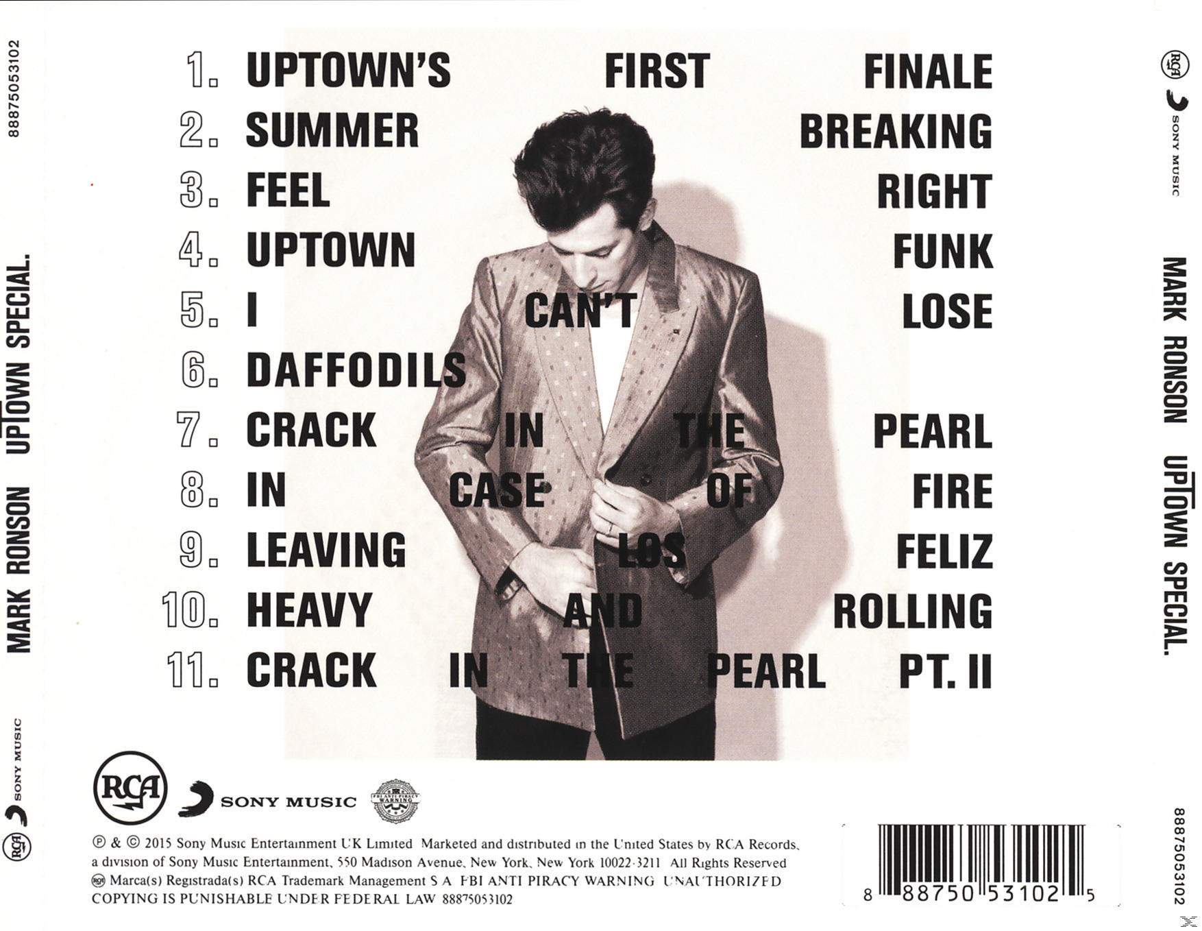 Albumhoes: Man in pak, met tekst met nummers en albumtitel 'Uptown Special'.