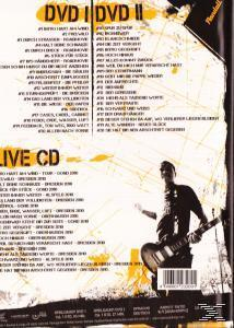 DVD-Rückseite: Songlisten mit einem Mann, der unten rechts Gitarre spielt. Gelber Hintergrund.