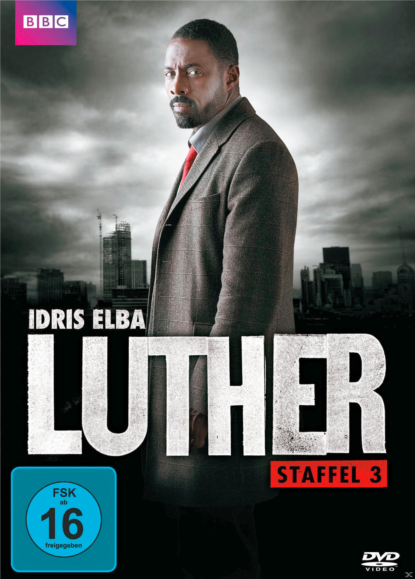 DVD-Cover mit Idris Elba. Er trägt einen Mantel. Der Hintergrund ist eine Stadt.