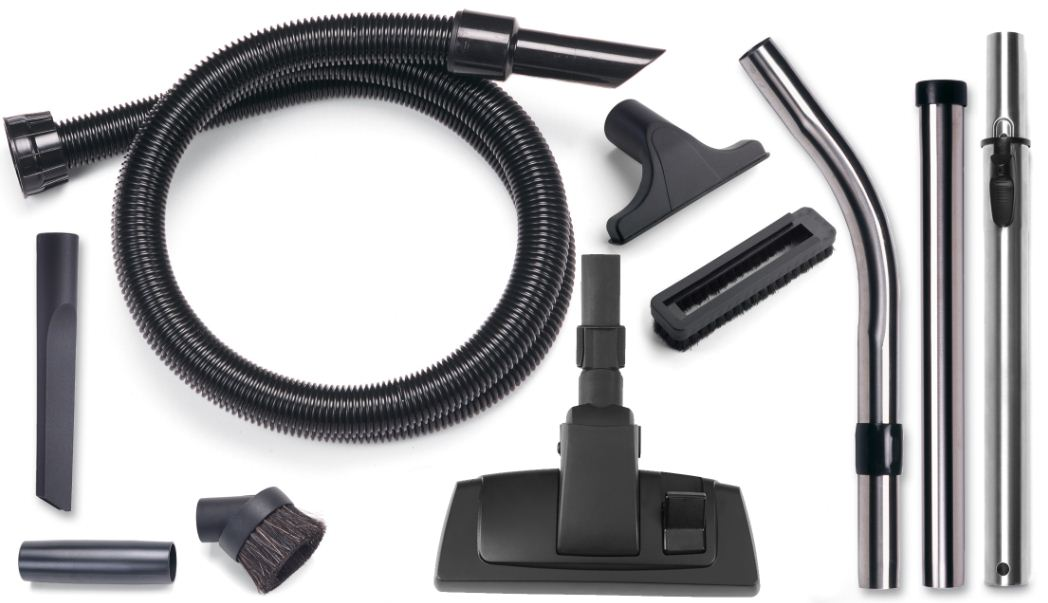 Vacuum cleaner attachments on white. Includes hose, wands, brushes, and nozzles, all black.
