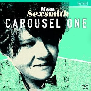 Albumcover mit Ron Sexsmith, betitelt 'Carousel One', mit türkisfarbenem Hintergrund.