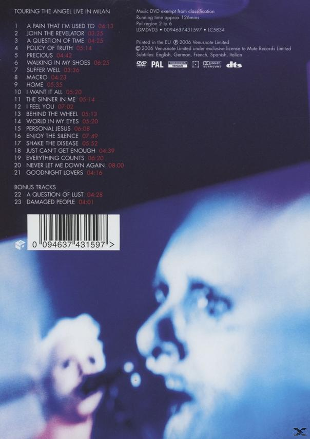 Rückseite einer DVD-Hülle mit Trackliste und verschwommenem Bild von zwei Personen.