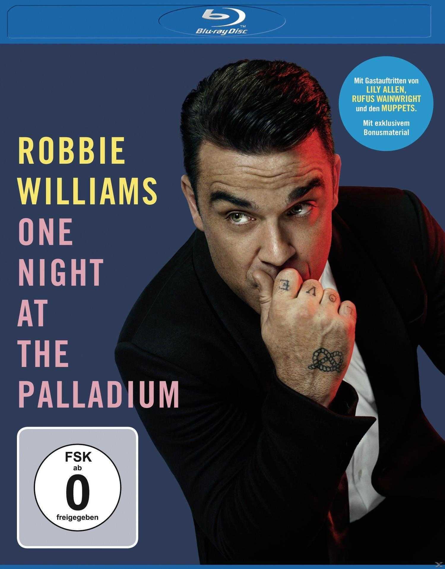 Robbie Williams Blu-ray-Cover. Mann in schwarzem Anzug. Text: One Night at The Palladium.