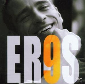 Eros Ramazzotti lächelt auf einem CD-Cover, mit dem Wort EROS in großen orangefarbenen Buchstaben.
