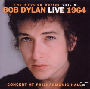 Albumcover. Bob Dylans Gesicht ist in der Mitte. Der Titel ist orange.