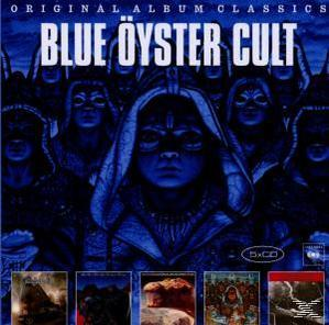 Albumcover, Blue Oyster Cult, blaues Bild, Gesichter und Text.