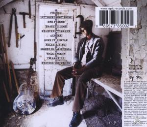CD-Cover zeigt einen Mann in einem dunklen Raum, eine Gitarre und eine Liste von Songs. Der Künstler ist France.