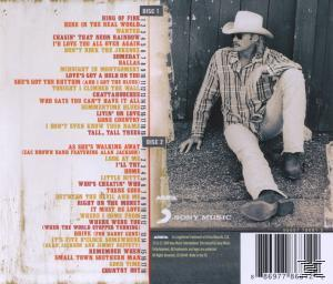 Albumcover mit Mann im Cowboyhut, der an einer Holzwand sitzt. Songtitel.